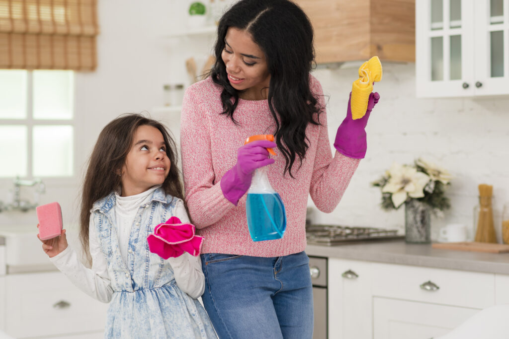 mom daughter cleaning-house